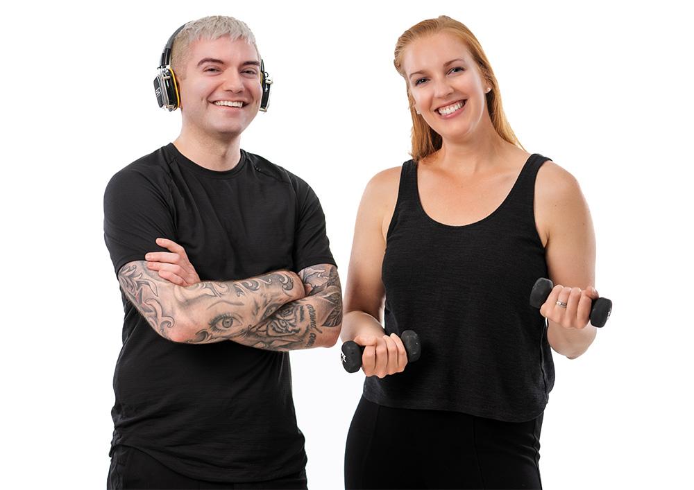 matt and alex with headphones and weights